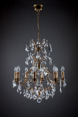 A glorious traditional sparkling crystal chandelier creates an atmosphere, a ceiling lamp for every home